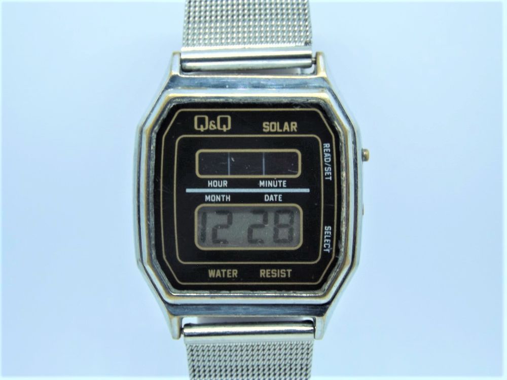 Rare montre LCD Solaire Q&amp;Q (Citizen) ann&eacute;es 1980 Bijoux et montres