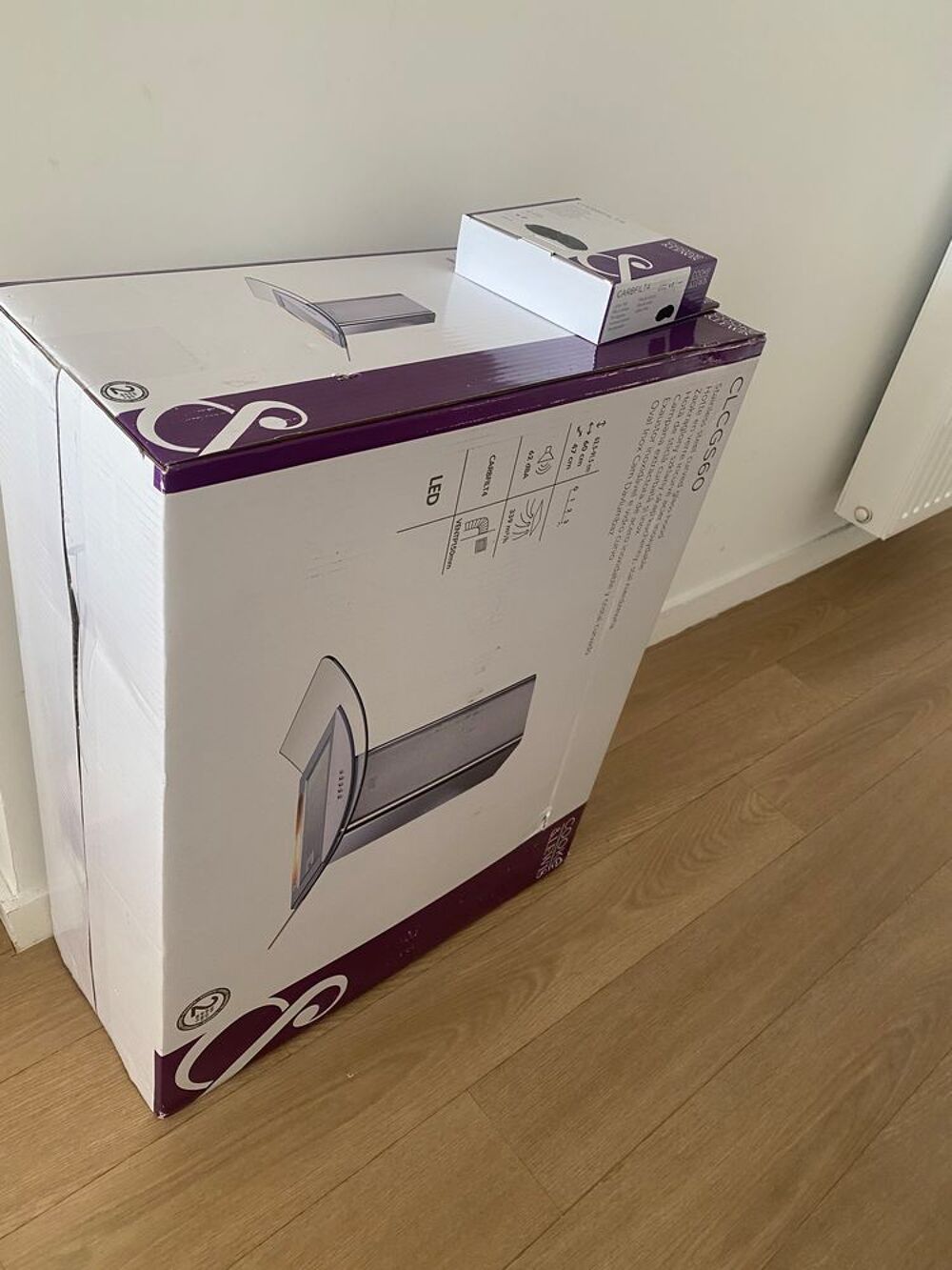 Hotte incurv&eacute;e neuve Electroménager