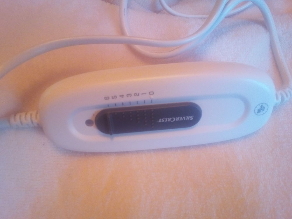Coussin chauffant cervicales Electroménager