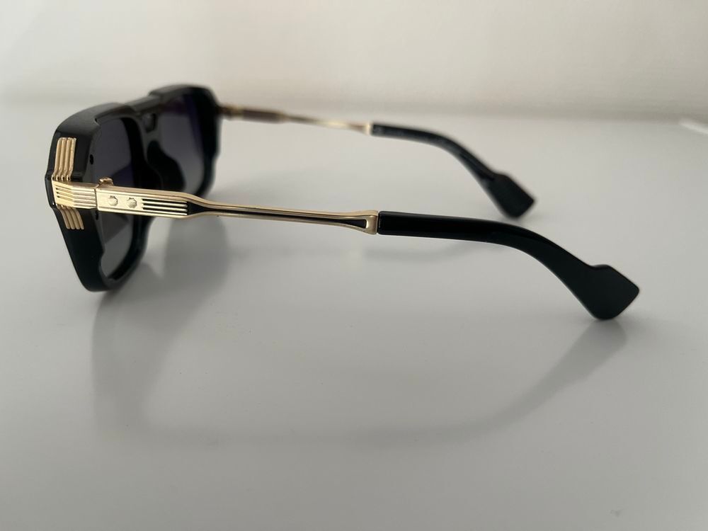 Lunettes de soleil, monture rectangulaire. Verre polariser neuve. Bijoux et montres