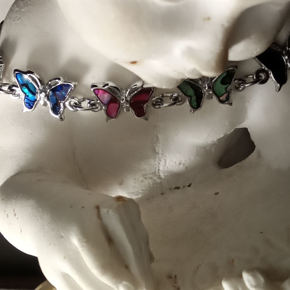 Joli bracelet avec papillons en nacre abalone Bijoux et montres