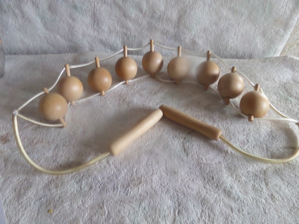 sangle de boulles pour le massage du dos et de la nuque Sports