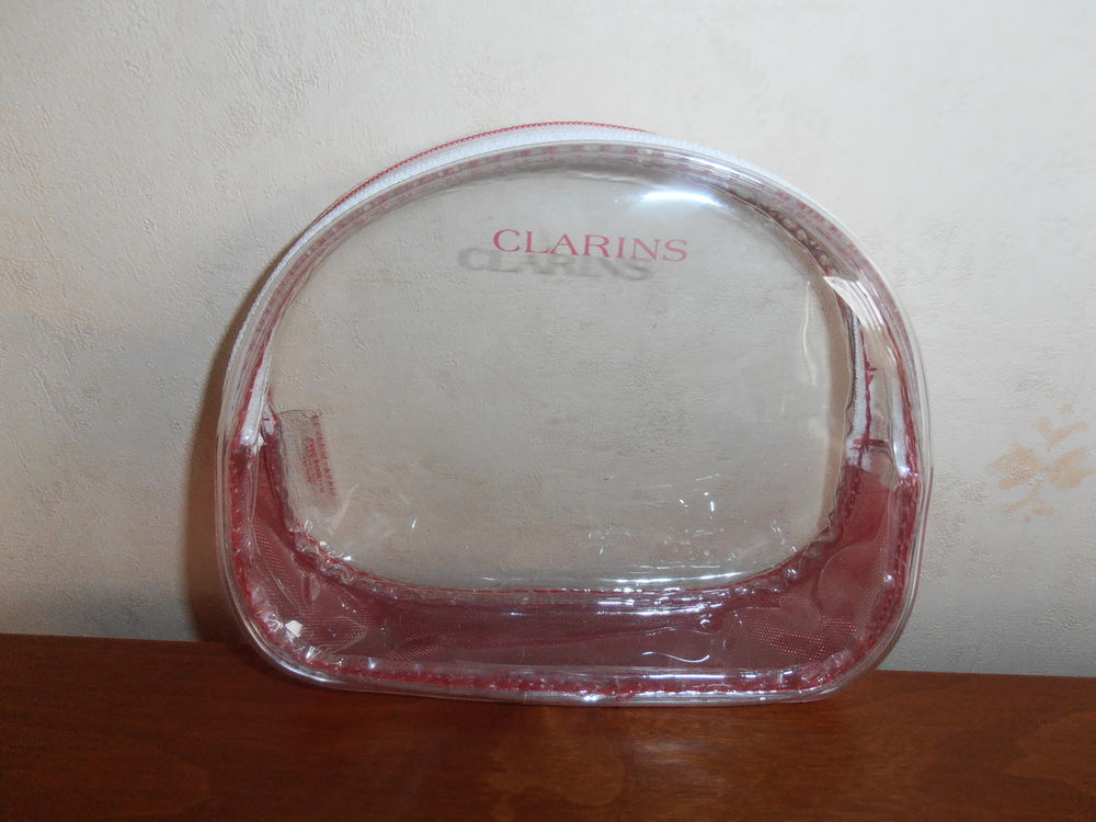 Trousse Clarins et flacons de voyage 1 (63) Maroquinerie