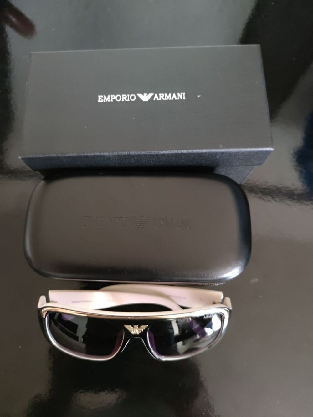 lunettes de soleil emporio armani mixte noire et blanche Bijoux et montres