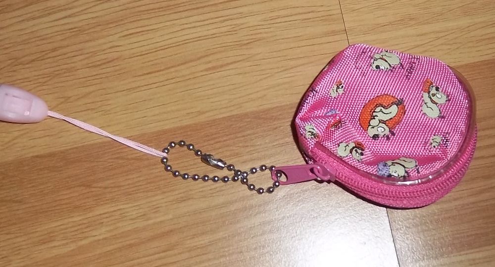 Porte monnaie enfant rose Jeux / jouets