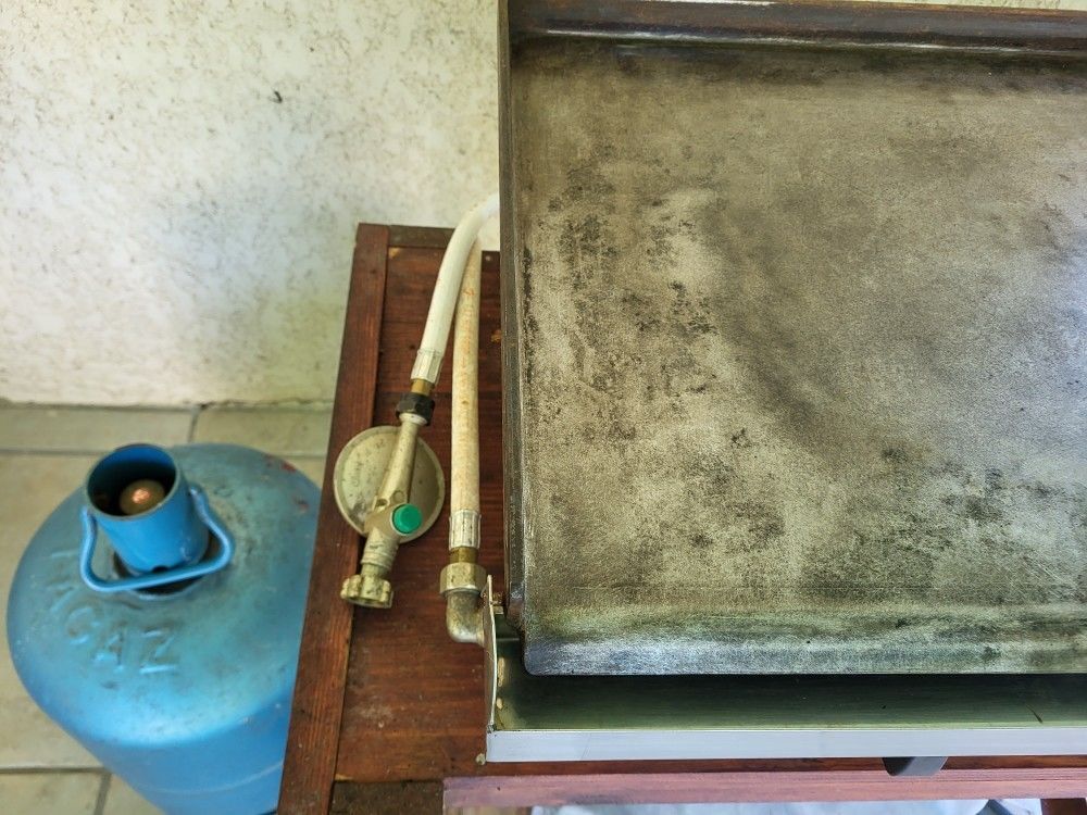 PLANCHE A GAZ EN FONTE 
MARQUE SIMOGAZ
Jardin