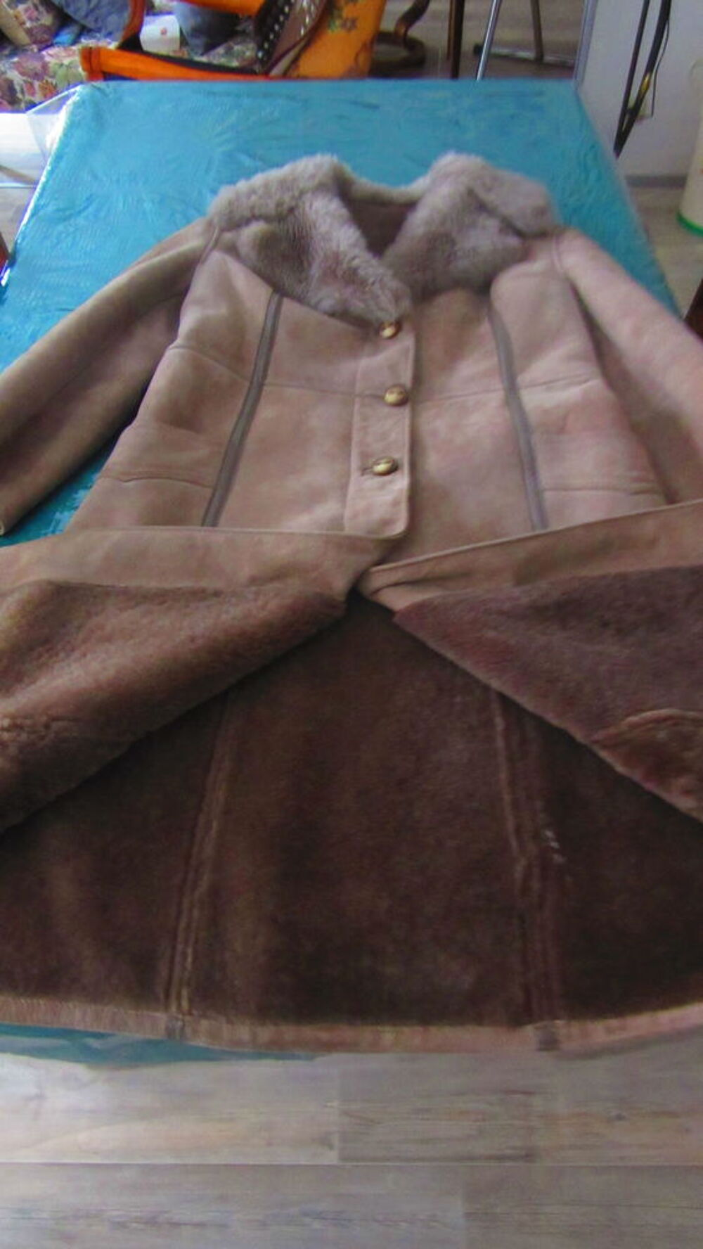 Manteau en peau Vtements