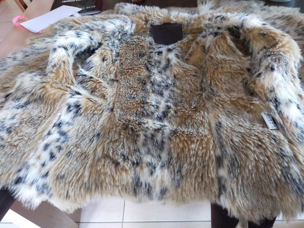 Veste en daim marron et fausse fourrure Vêtements