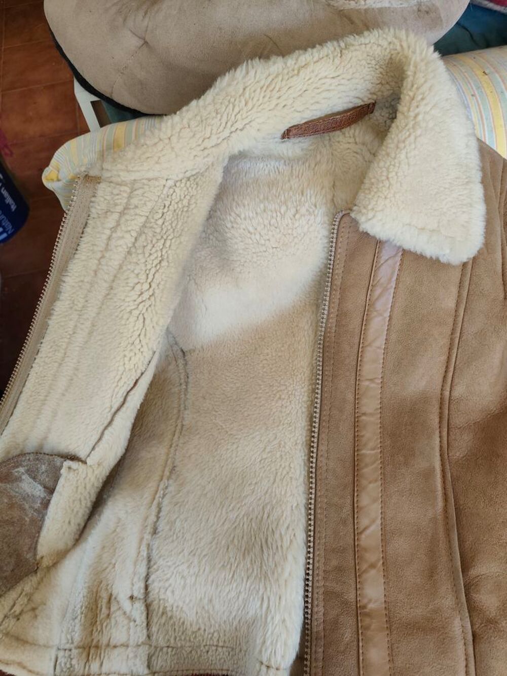 Blouson en peau fourr&eacute;e Vêtements