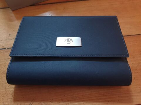 Couverture noire avec Agenda 2001 et le sigle Aix-les-Bains 10 Mouxy (73)