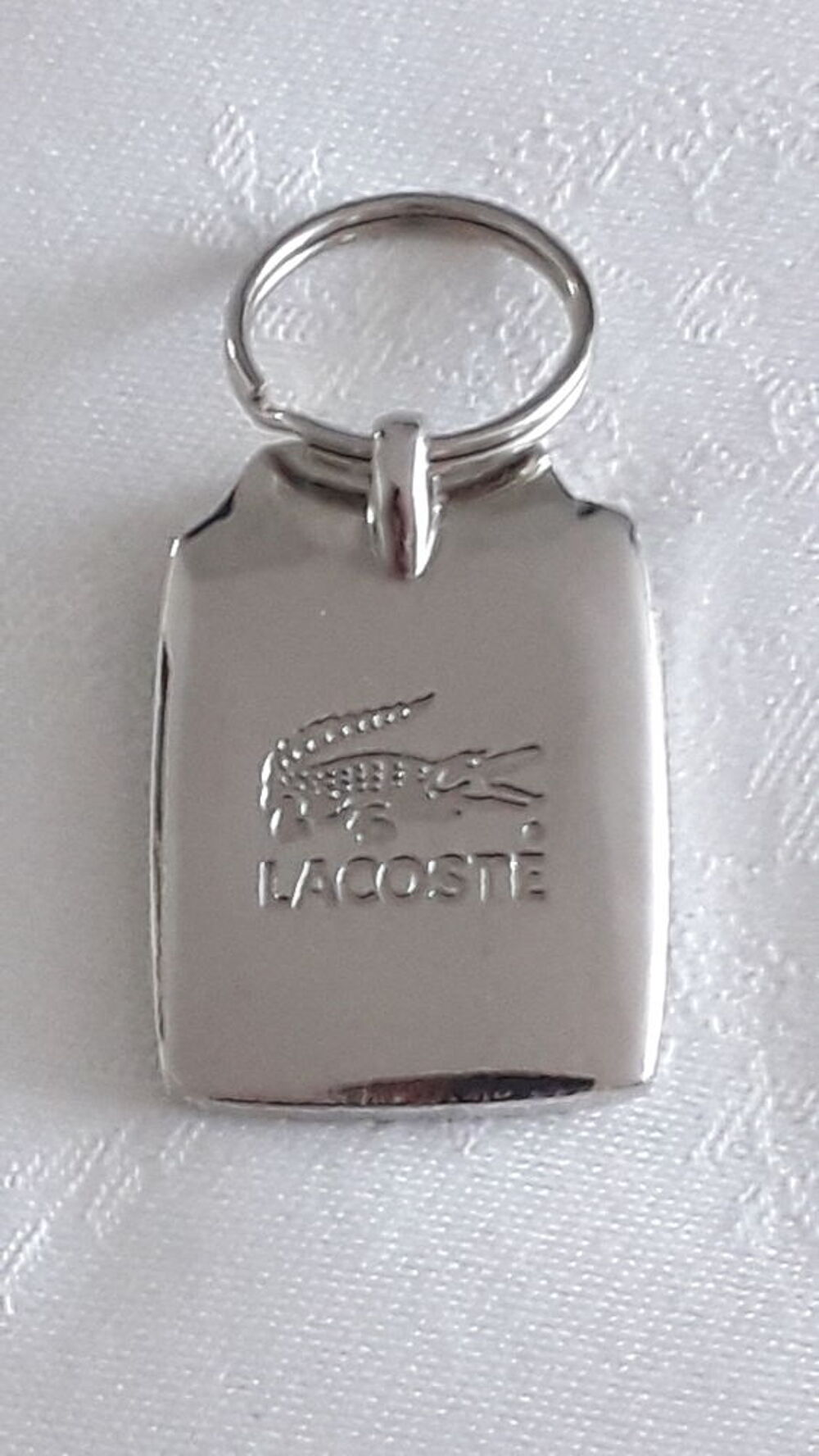 Porte-cl&eacute;s polo LACOSTE
Bijoux et montres