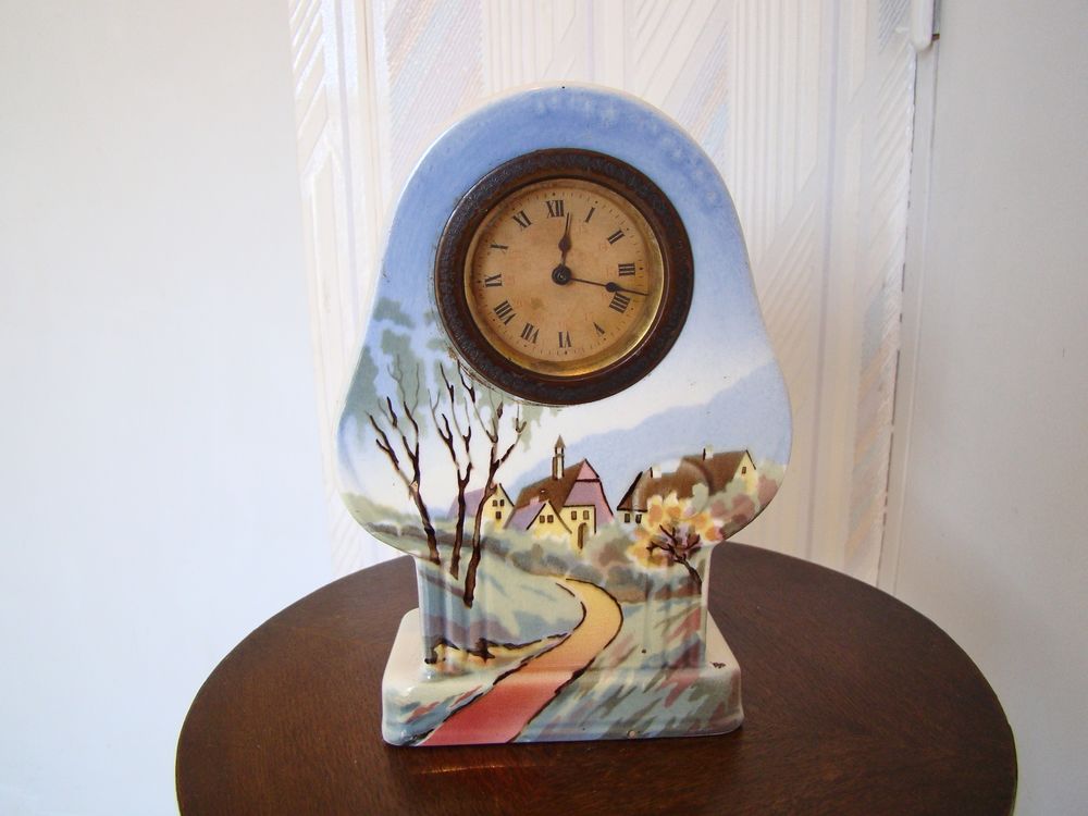 Pendule / Pendulette en fa&iuml;ence -Art d&eacute;co
Décoration