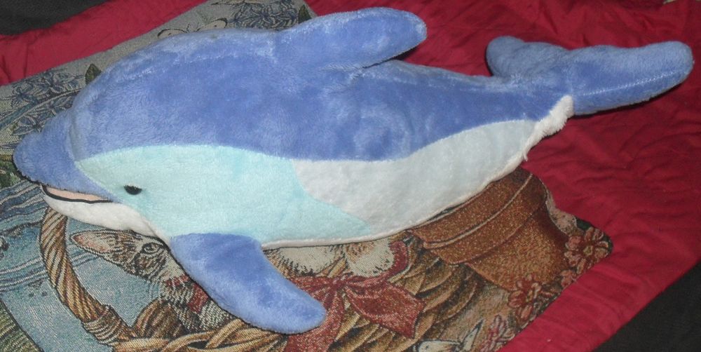 Tr&egrave;s jolie peluche Dauphin
Longueur 46cm. Jeux / jouets