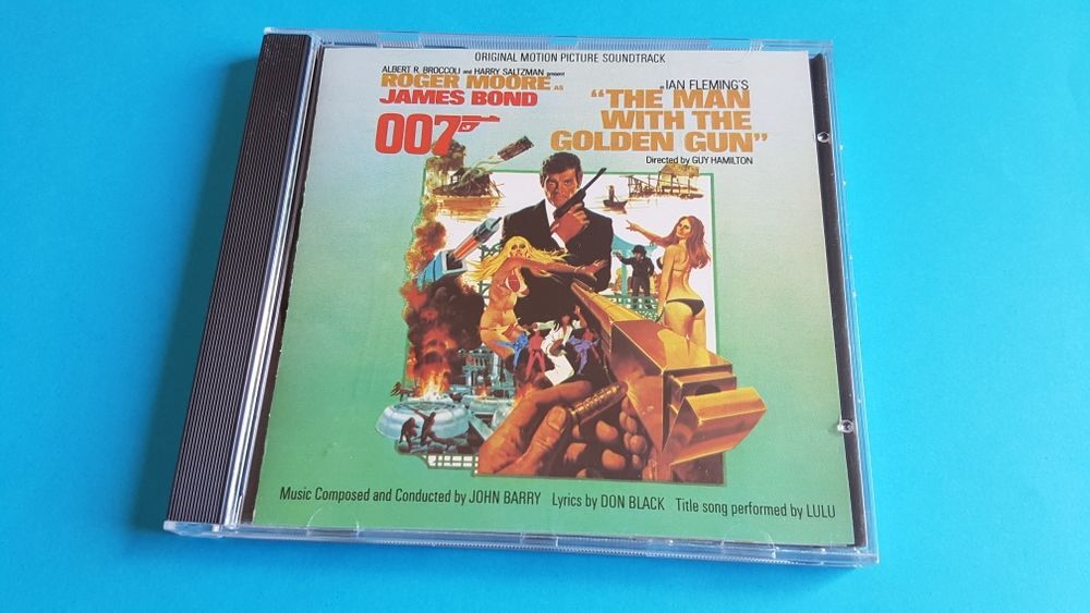 ROGER MOORE THE MAN WITH GOLDEN GUN CD et vinyles