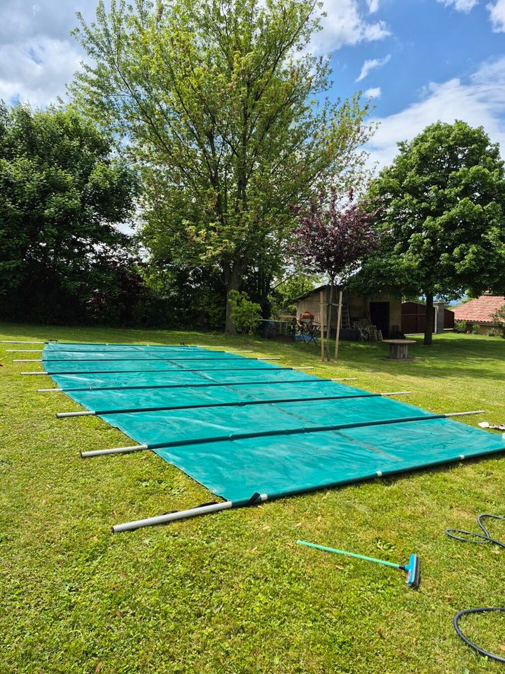 B&acirc;che piscine &agrave; barres Jardin