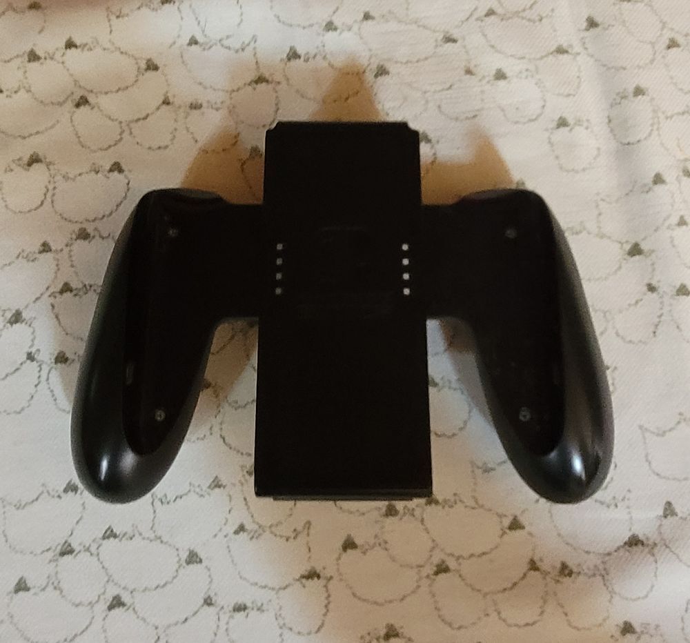 Nintendo Switch Oled avec housse et jeux Consoles et jeux vidéos