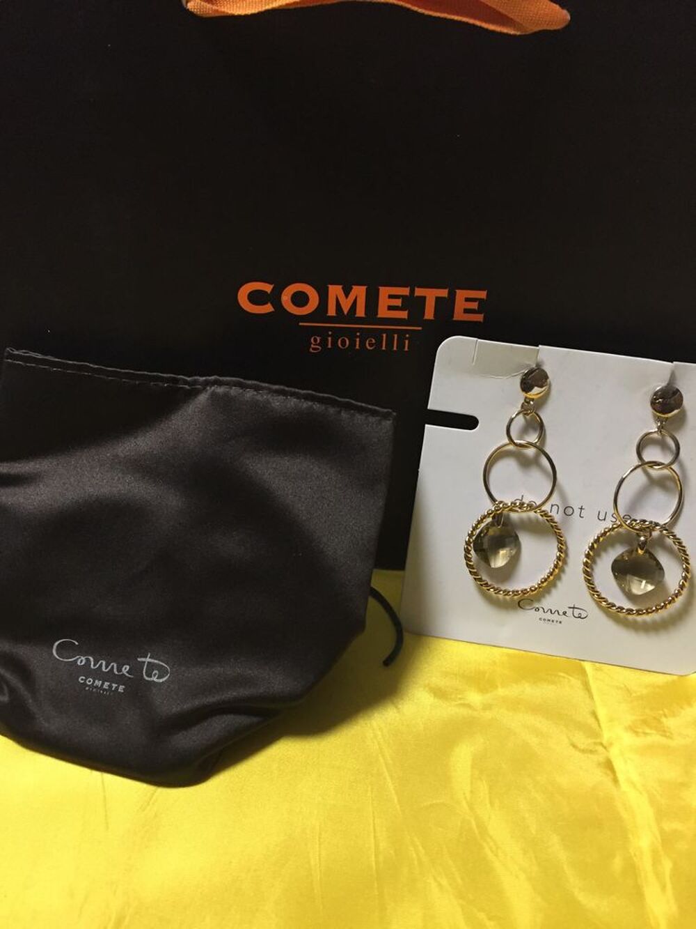 boucle d'oreille marque com&egrave;te, UORM 151 Bijoux et montres