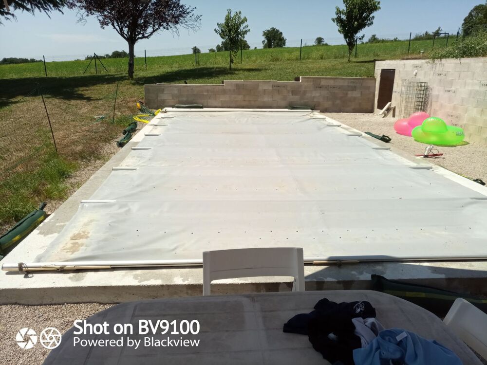 b&acirc;che &agrave; barre pour piscine Jardin