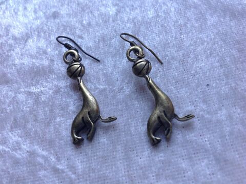 BOUCLES D'OREILLES OTARIE Envoi Possible
2 Tr�gunc (29)