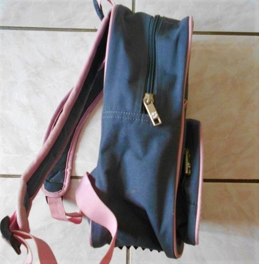 sac a dos gris et rose Billabong - H 34 x L 24
Maroquinerie