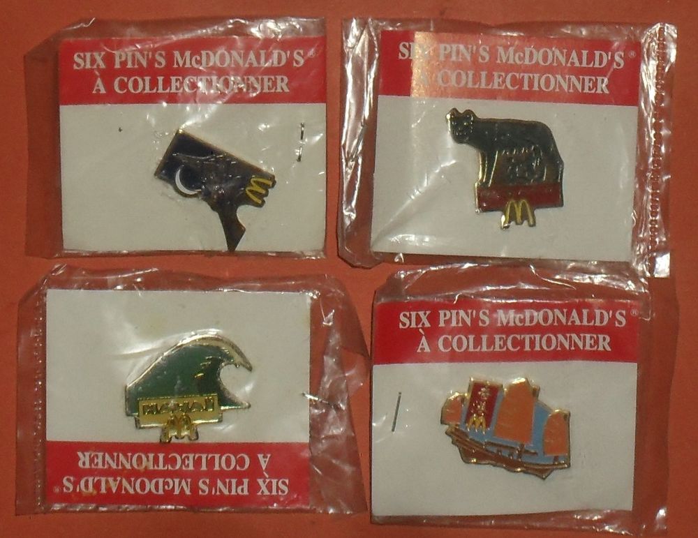 Lot de 4 Pin's Collection Mc Donald's. 