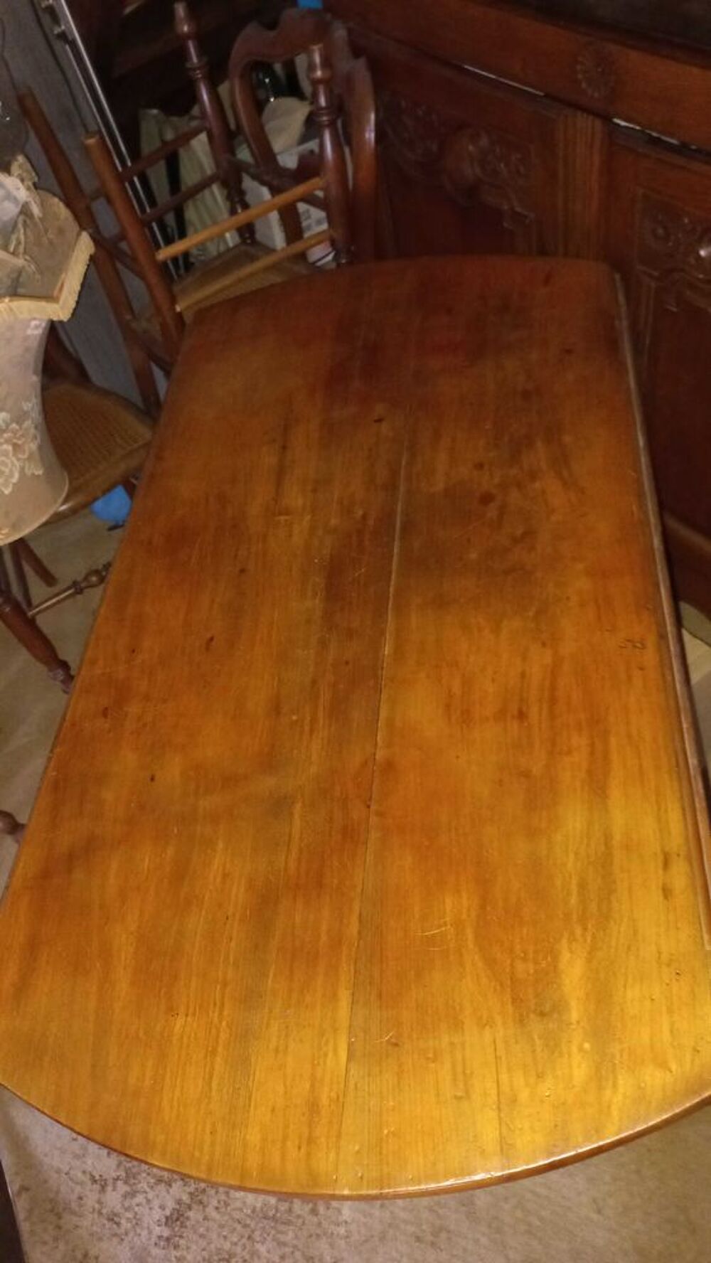 table &agrave; manger ronde en merisier Meubles