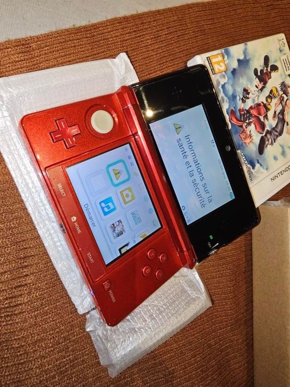 3ds rouge m&eacute;tallique + jeu Kingdom Hearts Consoles et jeux vidéos