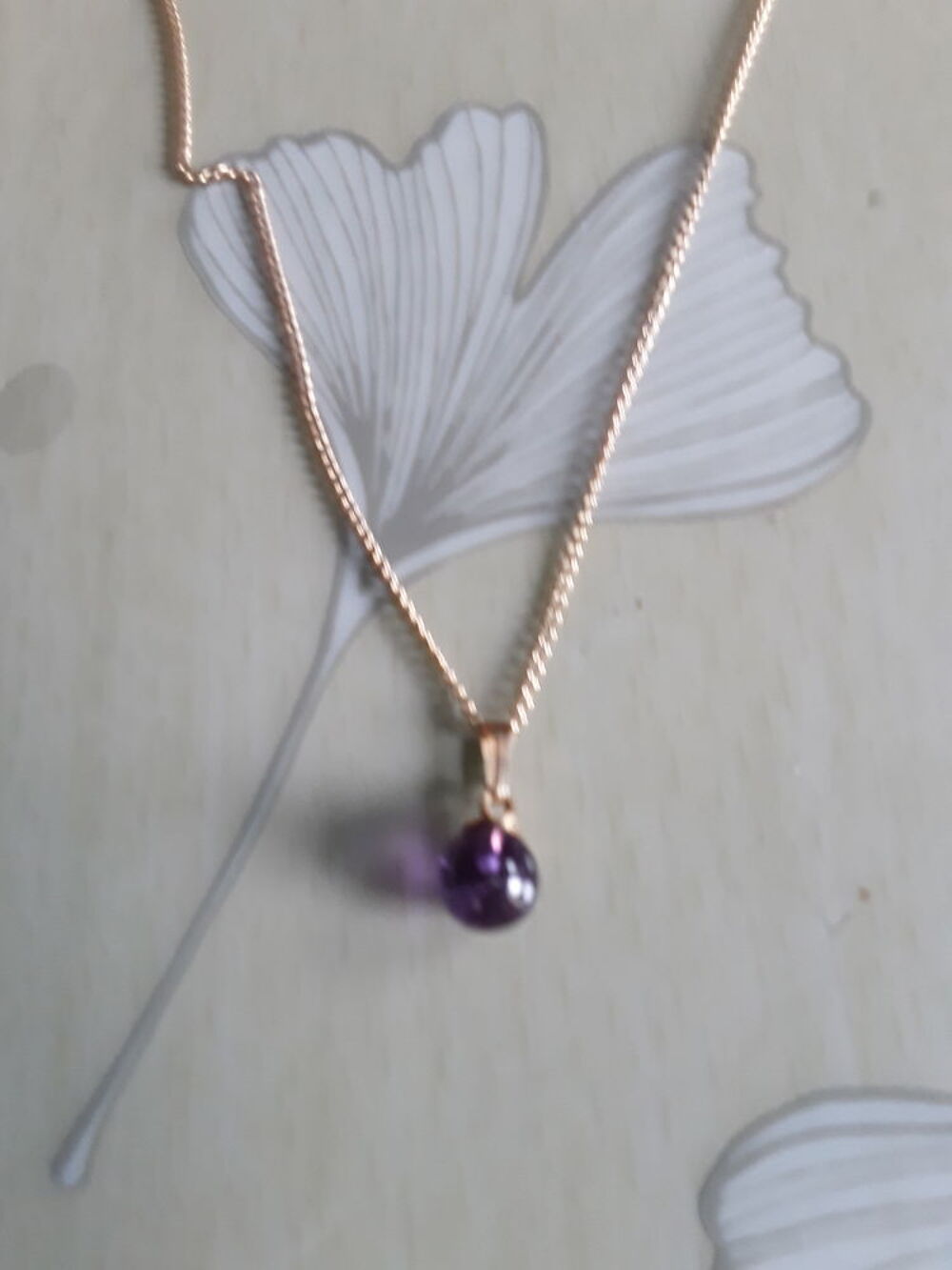 Pendentif perle violette Bijoux et montres