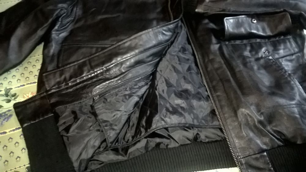 Blouson noir - v&eacute;ritable cuir - neuf - tr&egrave;s joli design - Vêtements
