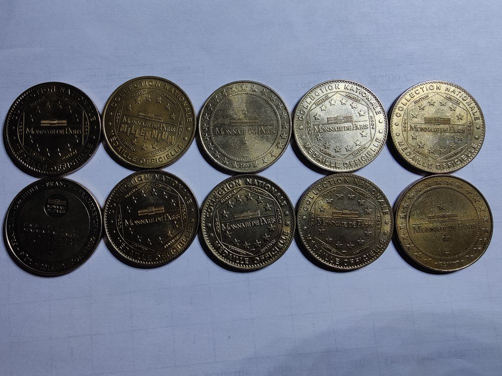 Lot de 10 jetons de la monnaie de Paris diff&eacute;rents. 
