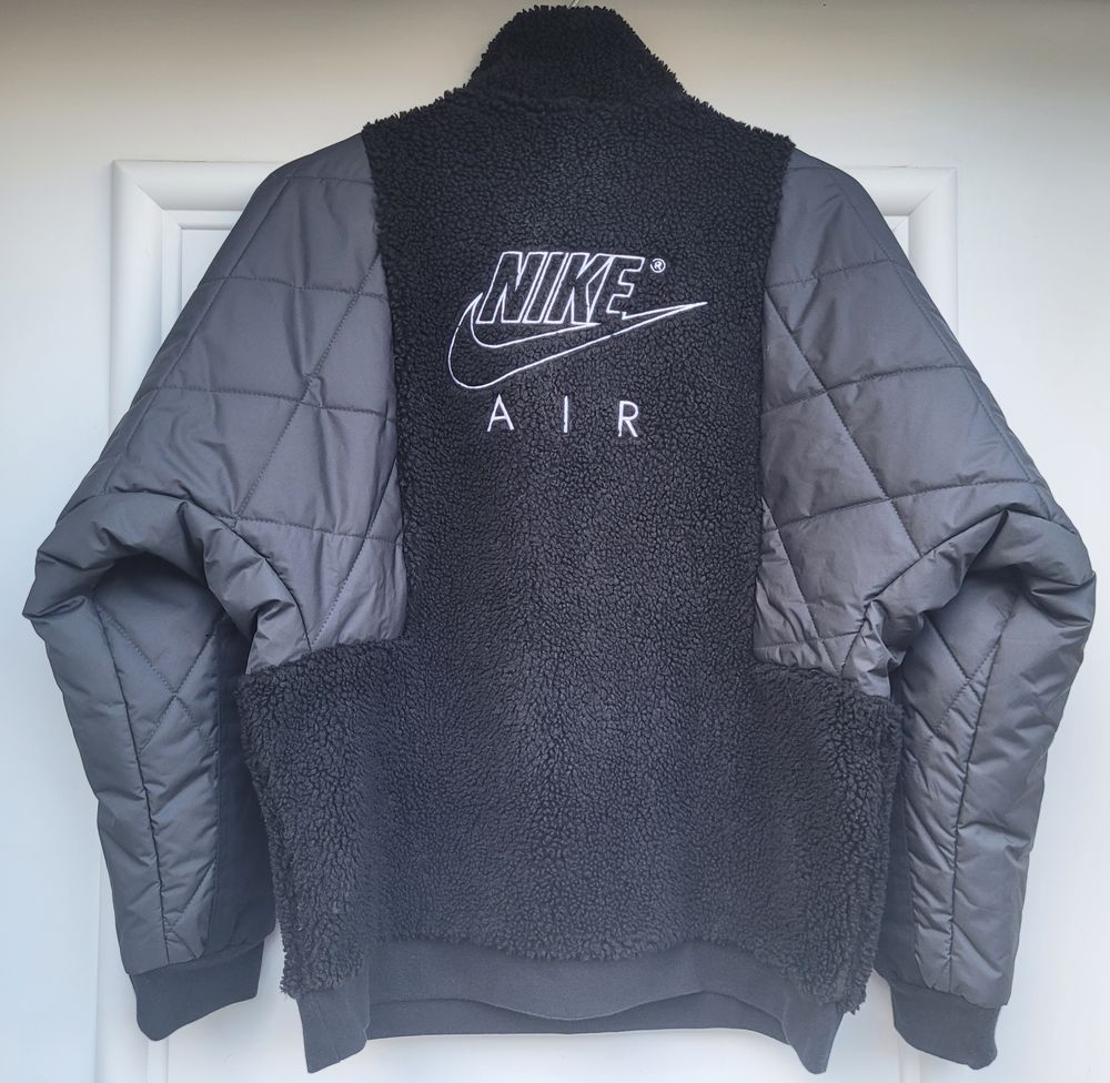 Veste d'hiver matelass&eacute;e / polaire Nike Air. V�tements