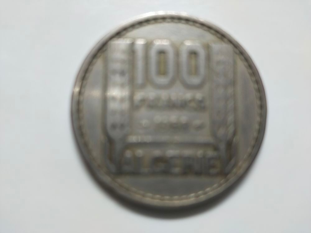 1 pi&egrave;ce de 100 francs alg&eacute;rienne ann&eacute;e 1950 . 