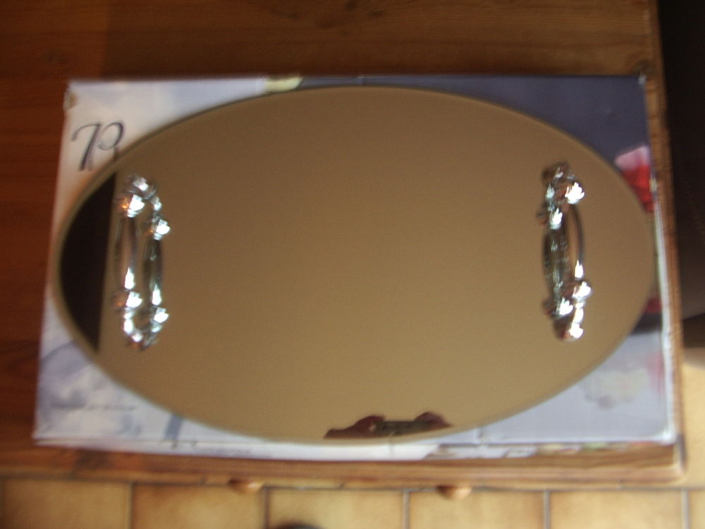 plateau miroir ovale en verre Electroménager