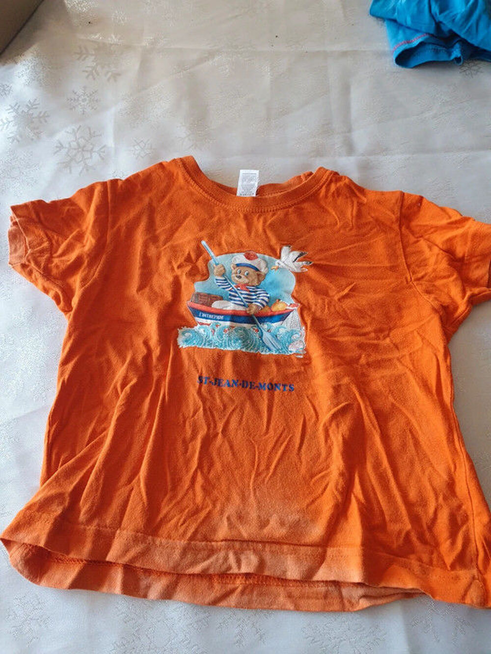 Tee-shirt orange
ourson 
4 ans 
Vêtements enfants