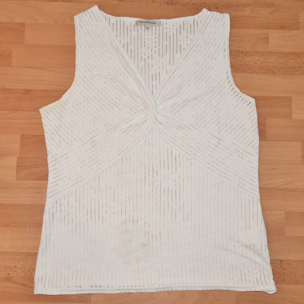 D&eacute;bardeur blanc. 42/44. Jacqueline Riu. Tr&egrave;s bon &eacute;tat
Vêtements