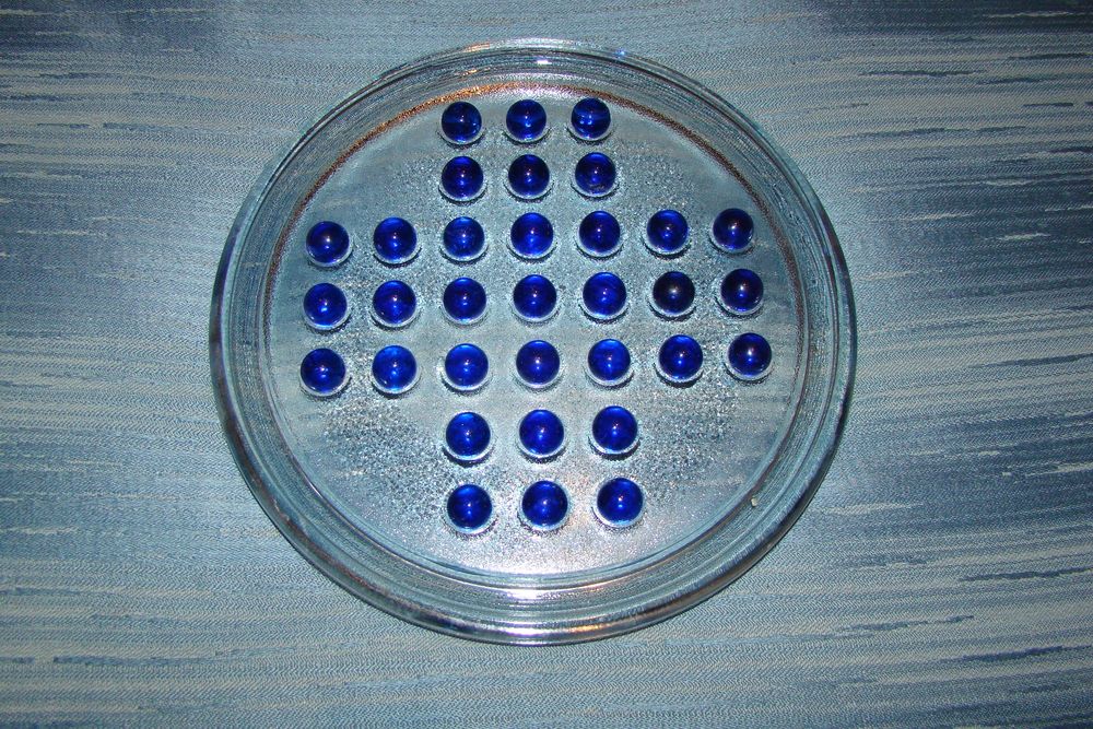 Jeu de solitaire en verre
Jeux / jouets