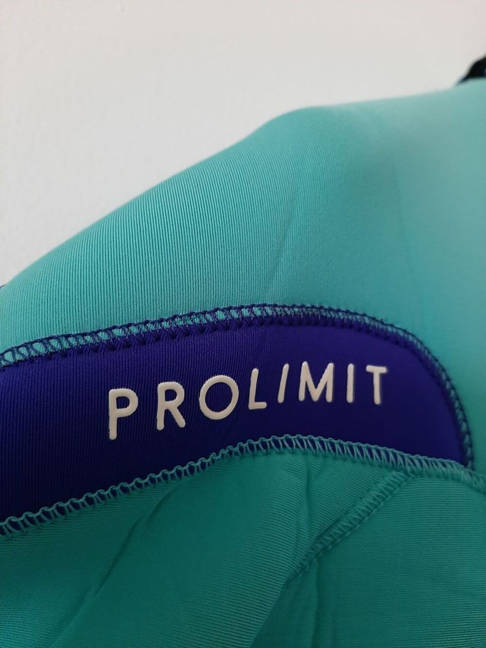Combinaison int&eacute;grale n&eacute;opr&egrave;ne noir turquoise Sports