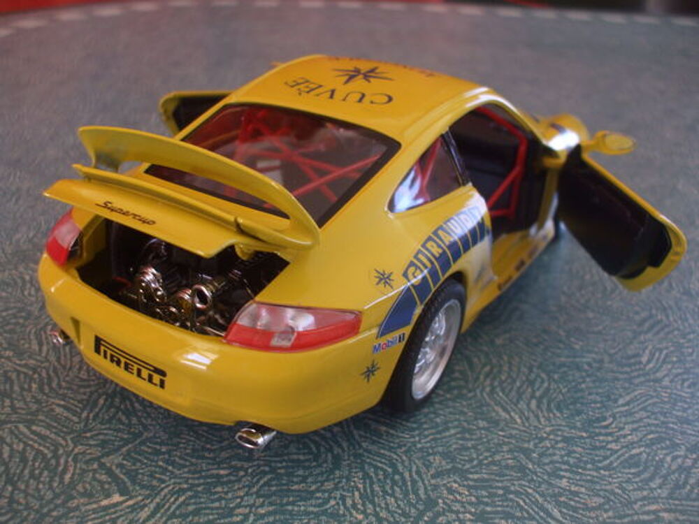 PORSCHE 911 CARRERA RACING DE 1993 JAUNE 
Jeux / jouets
