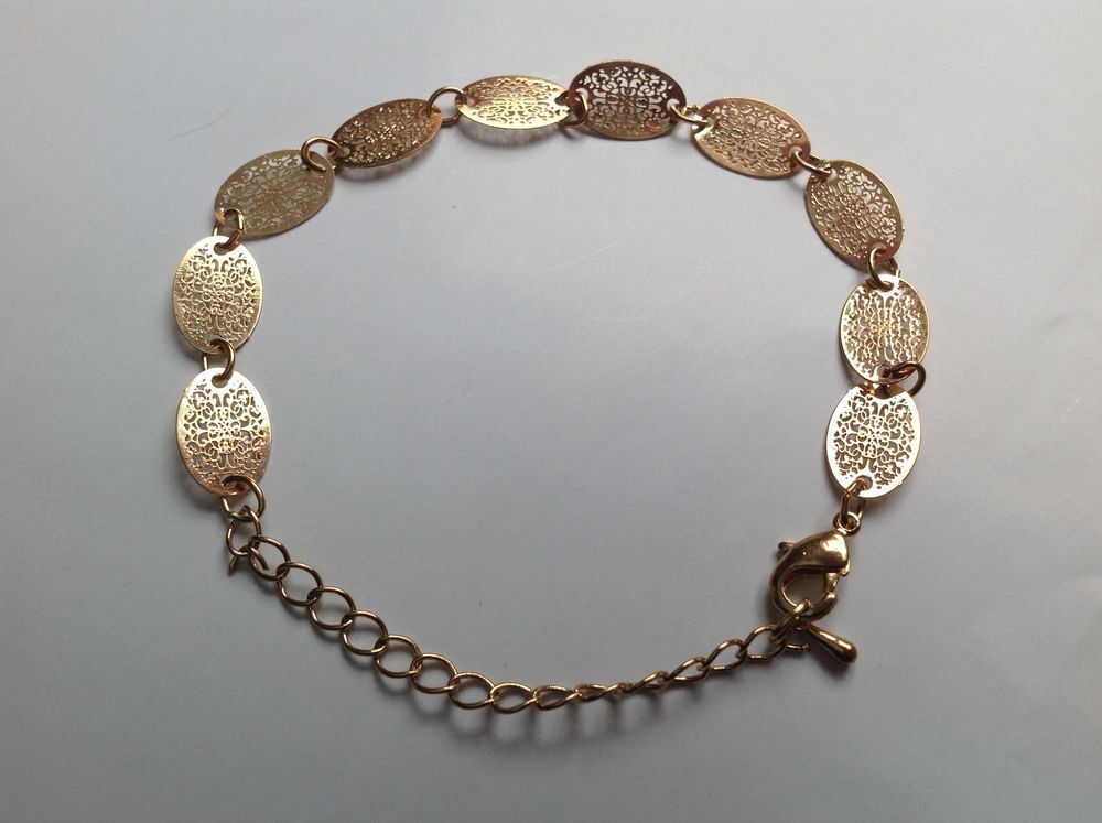 BRACELET OVALE DOR&Eacute;E D'ARABESQUES 23 cm Envoi Possible
Bijoux et montres
