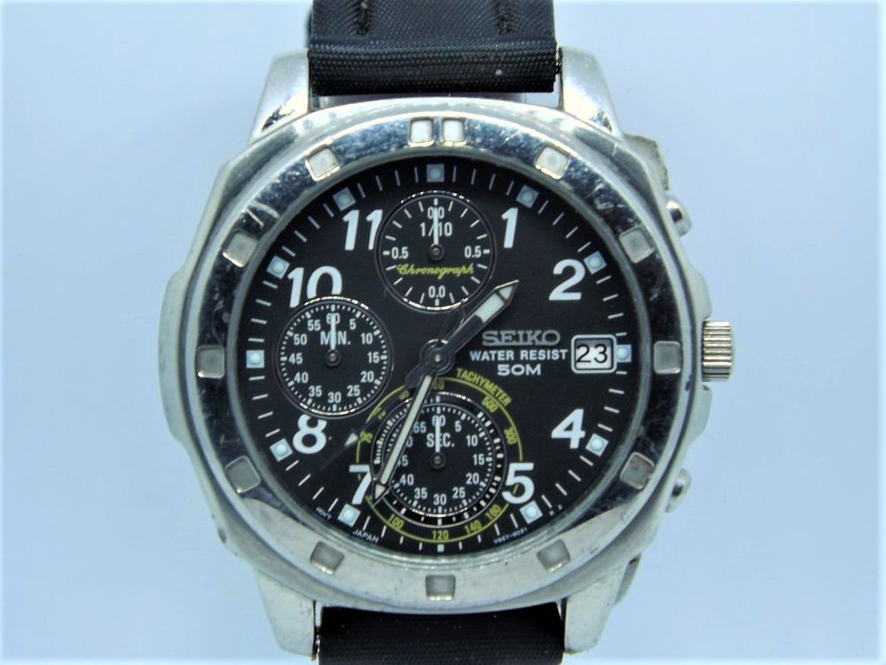 Tr&egrave;s belle chrono Seiko plong&eacute;e 1/10 sec V657-9019 1999 Bijoux et montres