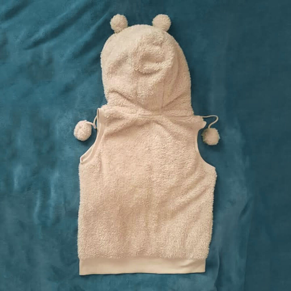 Gilet pilou, &agrave; capuche sans manche Vêtements
