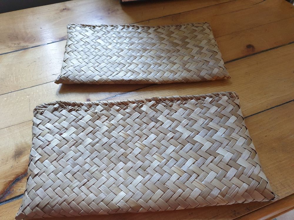 Pochette en raphia beige atypique
Maroquinerie