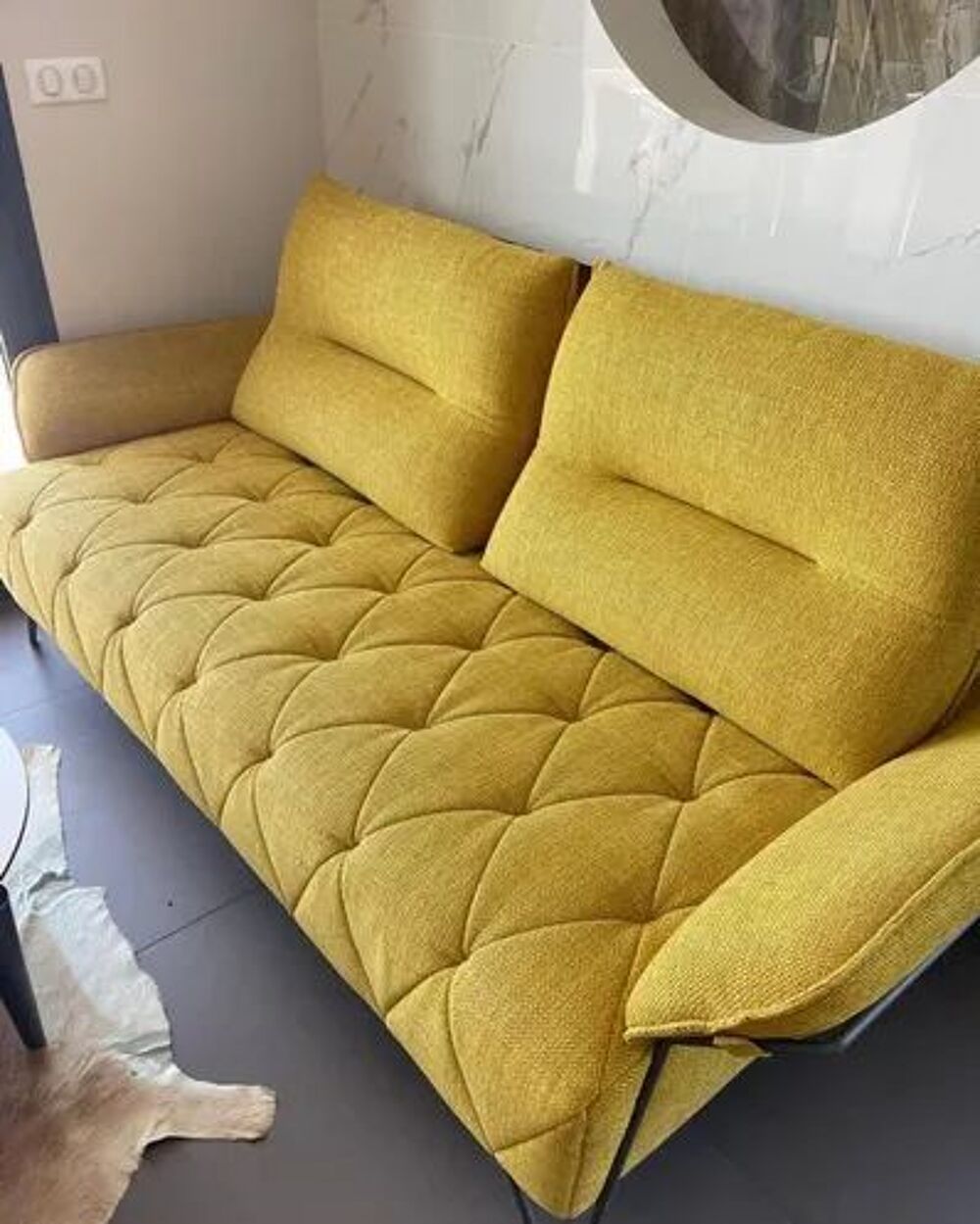 donne un canape suite a demenagement 
parfait etat Meubles