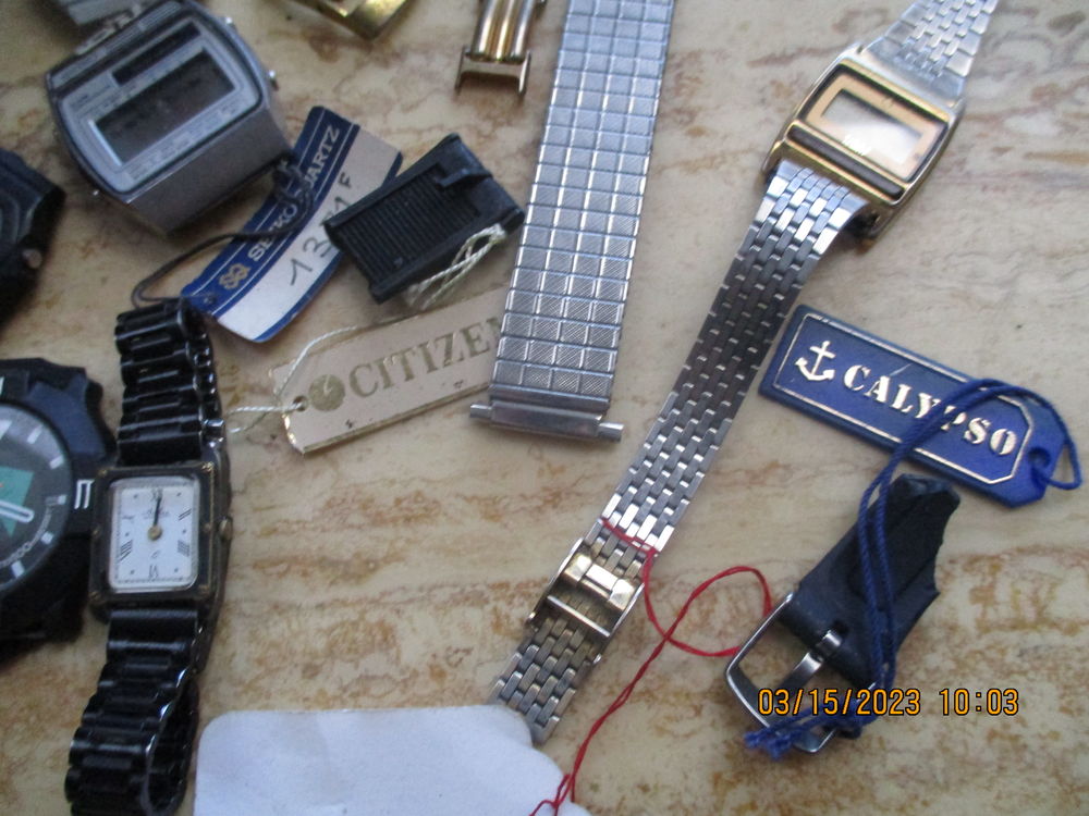 lot pi&egrave;ces d&eacute;tach&eacute;es montre horlogerie Bijoux et montres