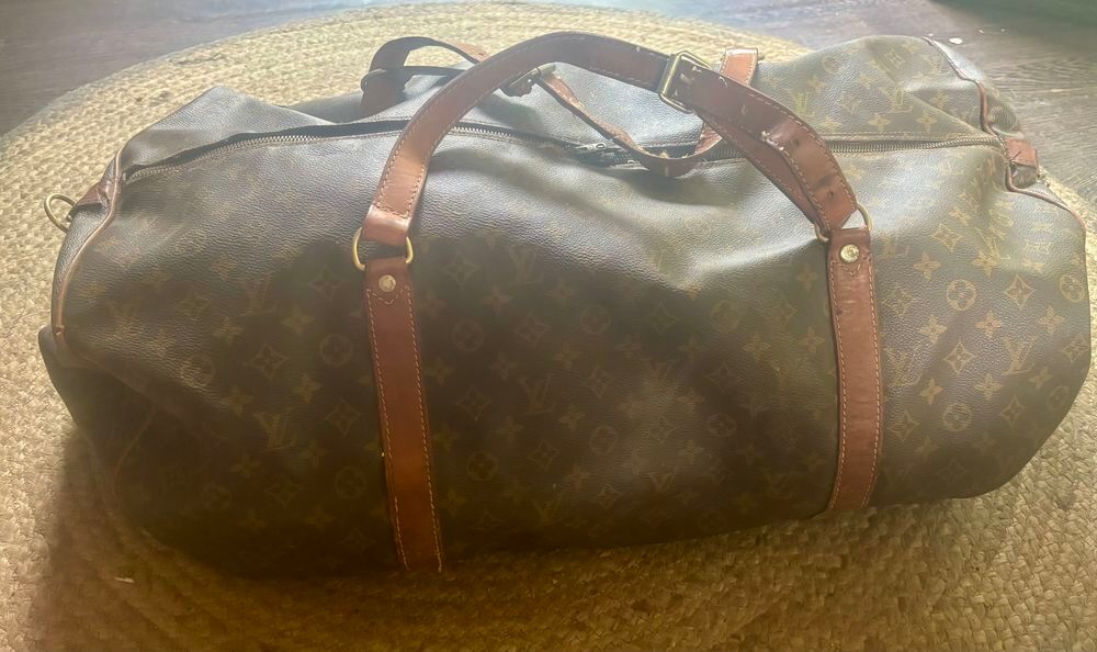 superbe sac de voyage vintage Louis Vuitton Maroquinerie
