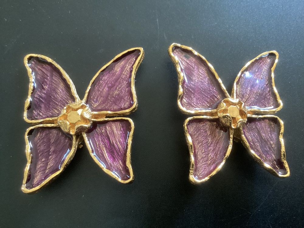 Boucle d'oreille Yves saint Laurent Bijoux et montres