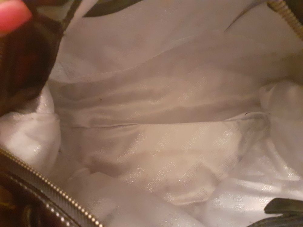 SAC &agrave;€ MAIN VERSUS Maroquinerie