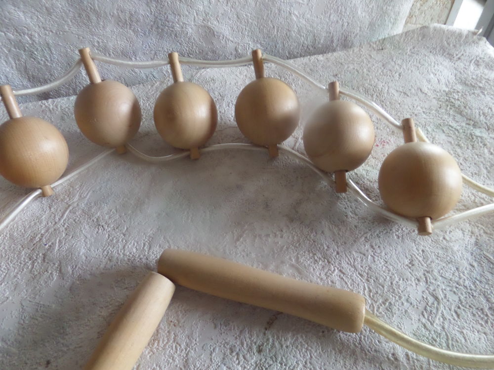sangle de boulles pour le massage du dos et de la nuque Sports