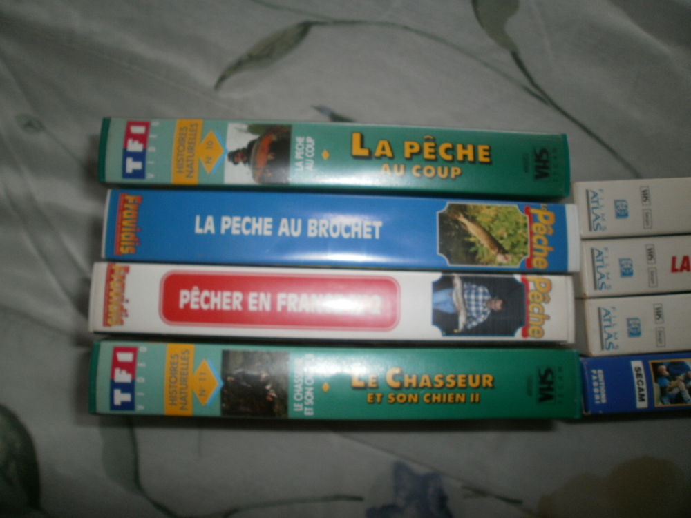 lot de cassettes vid&eacute;o sur la peche Photos/Video/TV