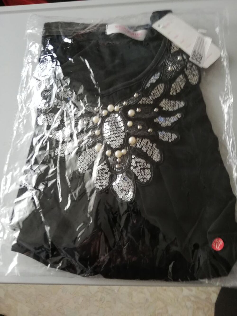 D&eacute;bardeur avec paillettes couleur noir Vêtements